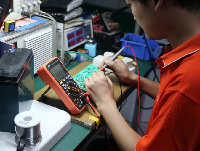 Battery charger supplier verification of sample output, charging behavior, connector and polarity before approval.