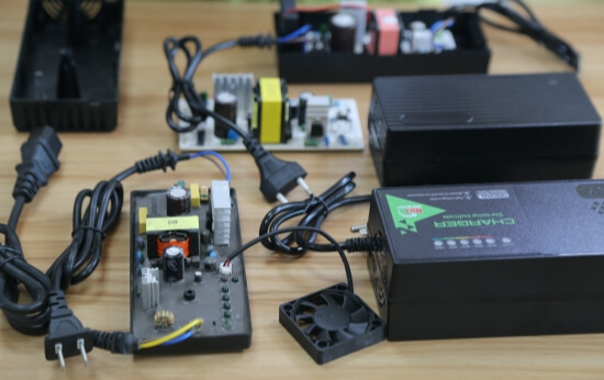 Custom battery charger cooling and structural options for fan-cooled, naturally cooled and potted applications.