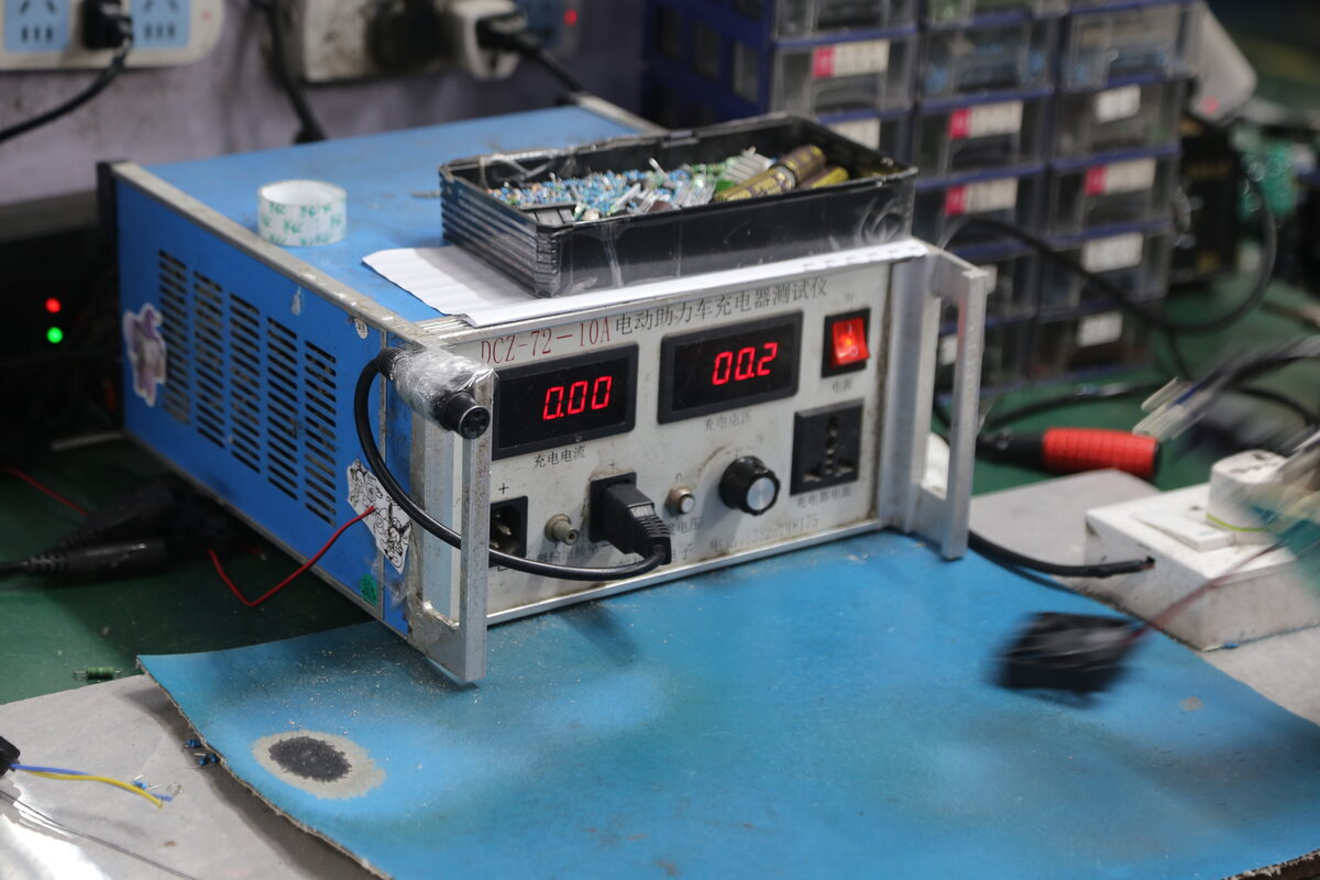 Factory test equipment used to verify battery charger voltage and current before release.