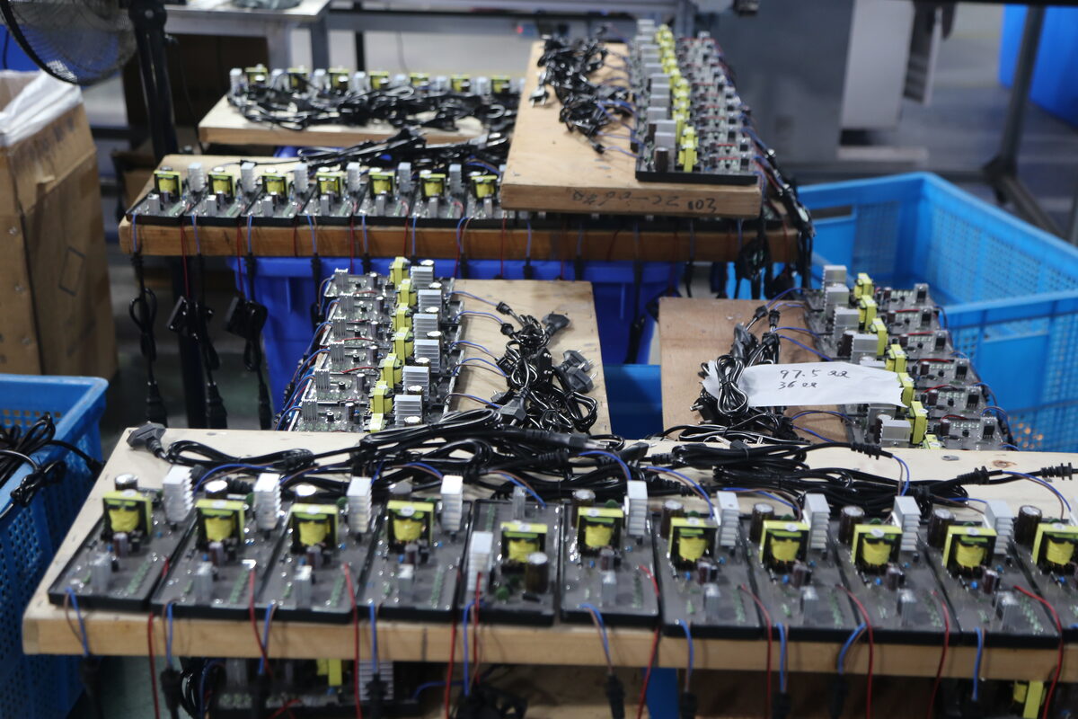 Battery chargers arranged for controlled full-load burn-in after current and thermal requirements are confirmed.