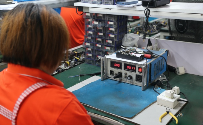 Battery charger electrical performance testing during production quality control
