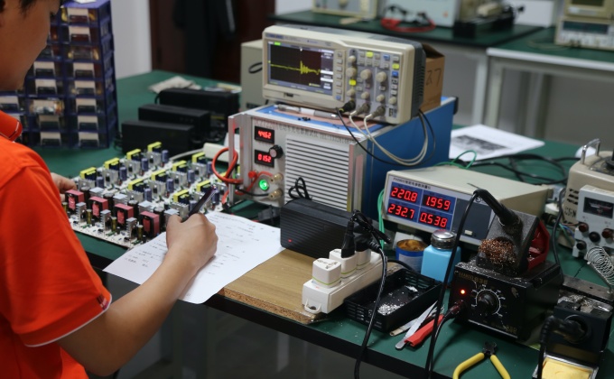 Battery charger factory quality testing for electrical performance and production consistency