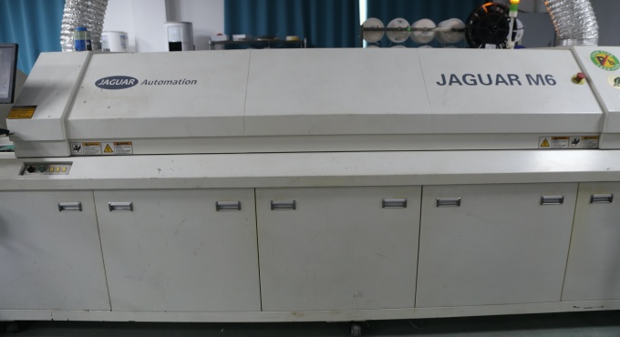 Reflow soldering oven used in battery charger PCBA manufacturing
