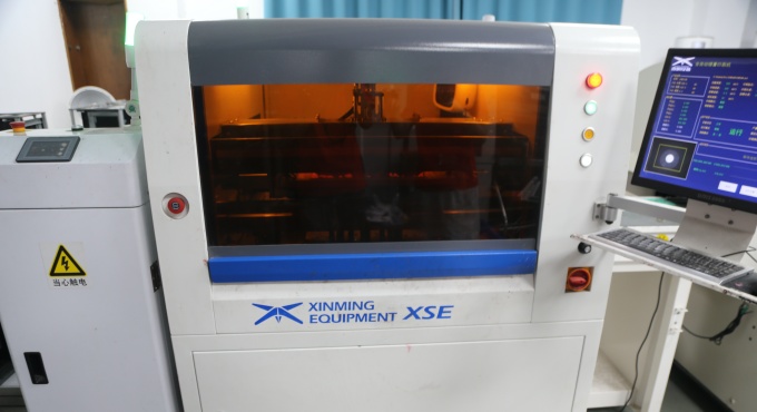 Automatic stencil printing machine for applying solder paste to battery charger PCBA boards
