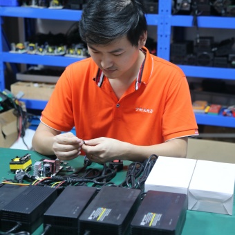 Custom battery charger configuration for charging current, plugs, connectors, cables, housings, labels, and packaging.