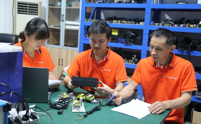 Linjia technical team coordinating custom OEM battery charger projects from specification review through production and shipment.  
