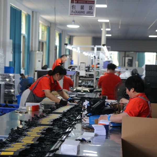 Custom battery charger final inspection verifies plugs, connectors, polarity, labels and packaging before bulk shipment.