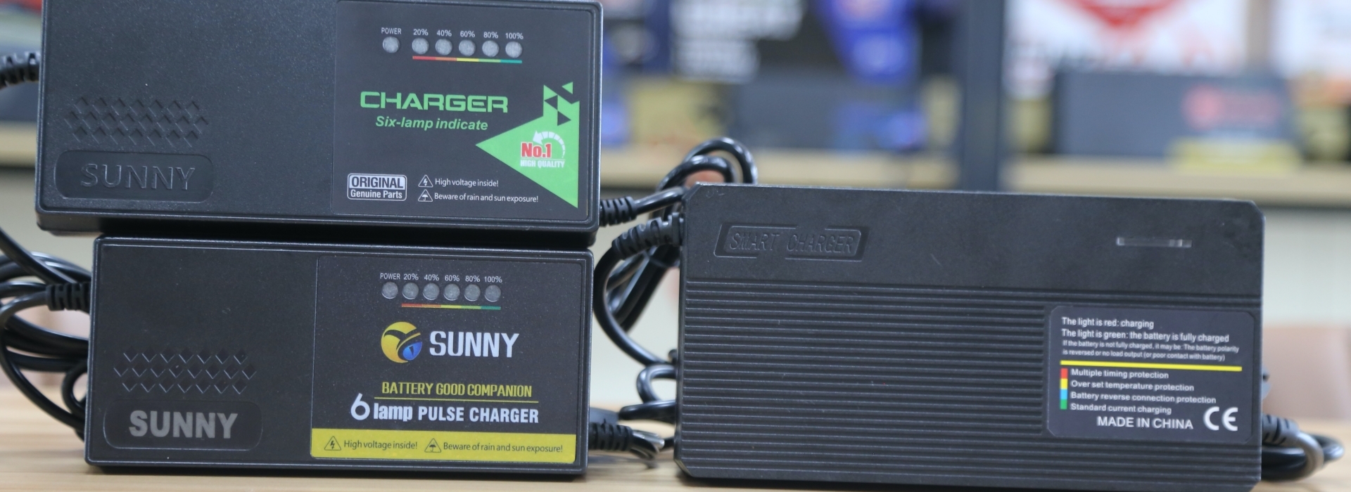 Linjia custom e-bike battery chargers for 48V lithium and 36V lead-acid battery systems in OEM projects.