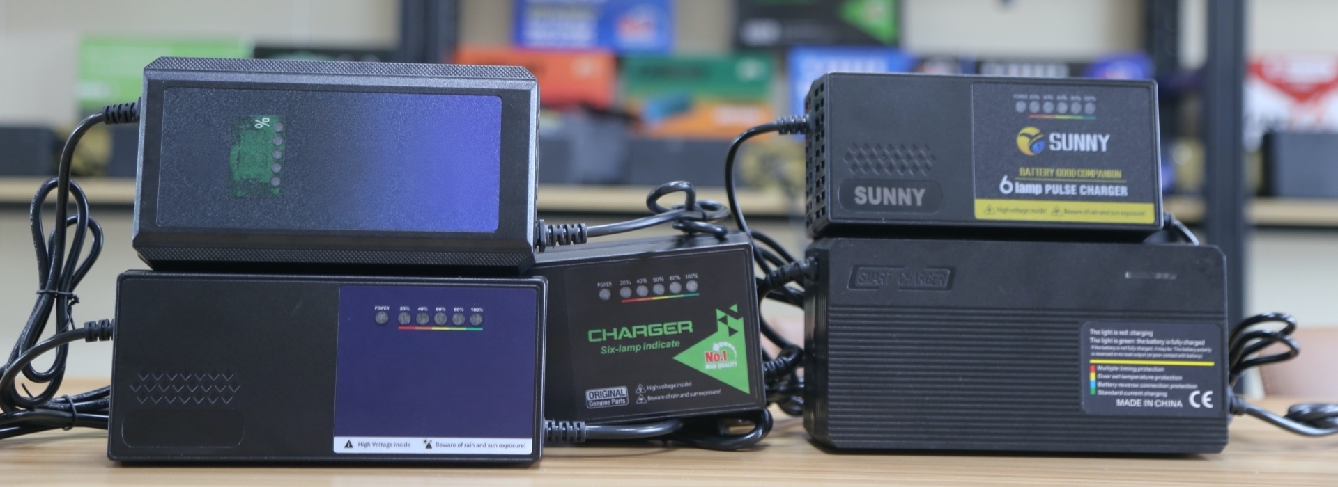 Custom 48V, 60V and 72V electric scooter battery chargers manufactured by Linjia for OEM and ODM supply.