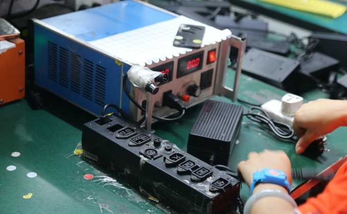 Finished battery charger electrical testing with production test equipment
