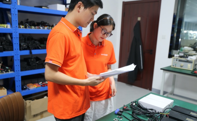 OEM battery charger support team helping B2B buyers confirm specifications, samples, production and delivery requirements.
